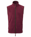 A sleeveless maroon fleece vest with a front zipper and high collar from the Premier collection, product code PR803.
