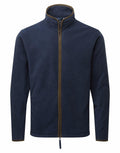 A Premier PR823 navy blue fleece jacket featuring a high collar and full-length zipper with brown trim along the zipper and collar edges. The jacket has long sleeves, and the fabric is exceptionally soft and cozy.
