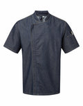 Premier's PR906 is a dark denim short-sleeve chef jacket featuring an asymmetrical front closure and a pen holder on the left sleeve.
