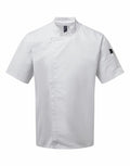 Premier's PR906 is a white short-sleeved chef jacket featuring a stand collar and a side pocket on the sleeve.