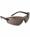 A pair of black, wraparound safety glasses with dark tinted lenses, the PW033 by Portwest.