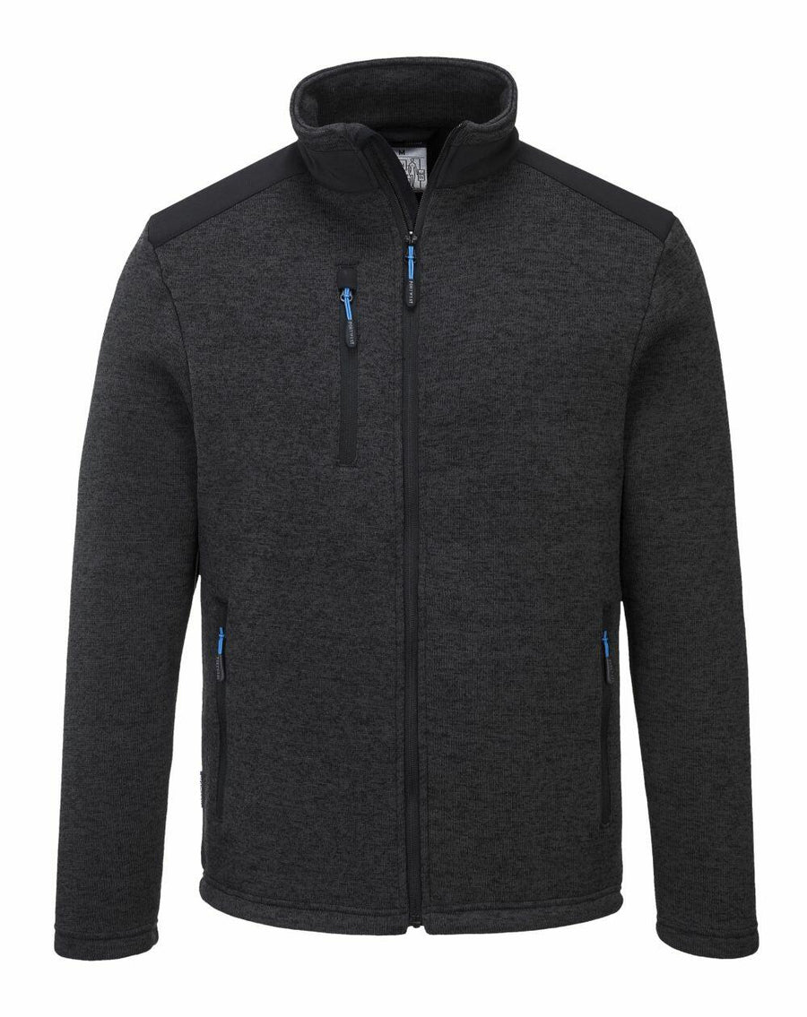 The PW292 by Portwest is a charcoal gray jacket featuring black shoulder accents, a full zipper, three zippered pockets, and a high collar.