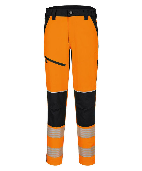 The Portwest PW3 Hi-vis stretch trousers (T140) are bright orange work trousers with black accents, multiple pockets, and silver reflective bands around the lower legs.