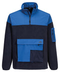 The Fleece is a long-sleeve pullover with a zip-up collar, made of dark blue fabric with bright blue accents on the shoulders, pocket flaps, and sleeve. It features a large front pocket and a small zipped pocket on the left sleeve.