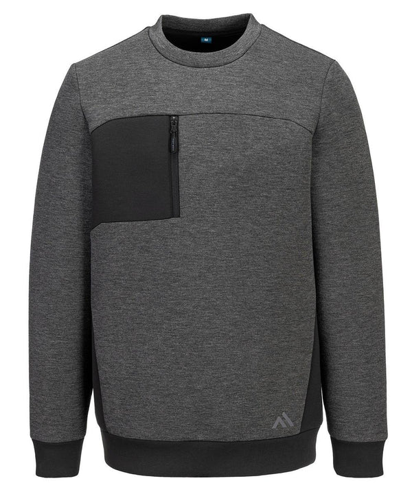 The Portwest KX3 Sport Tech Sweatshirt (KX377) features a dark grey crew neck, long sleeves, a black zippered left chest pocket, and a small logo at the lower right front for a simple, modern look.