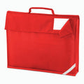 Introducing the Quadra QD051: a red book bag designed with convenience and safety in mind. It features a handle and a fold-over flap secured by Velcro-fastened corners. The bag includes a name card pocket with lined spaces for easy identification, along with a reflective strip on the bottom corner to enhance visibility.