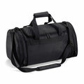 Introducing the Quadra QD070, a sleek black duffel bag featuring a spacious main compartment, side pockets for easy organization, a convenient top handle, and an adjustable shoulder strap for comfortable carrying.