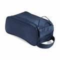 The Quadra QD076 is a dark blue rectangular toiletry bag, featuring a handle and a zippered pocket on the side, designed with a simple and sleek aesthetic.