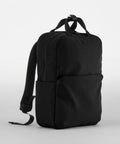 A black backpack with a minimalist design featuring a large front pocket and a small side pocket. It has adjustable shoulder straps and a top handle. The backpack is the QD271 by Quadra.