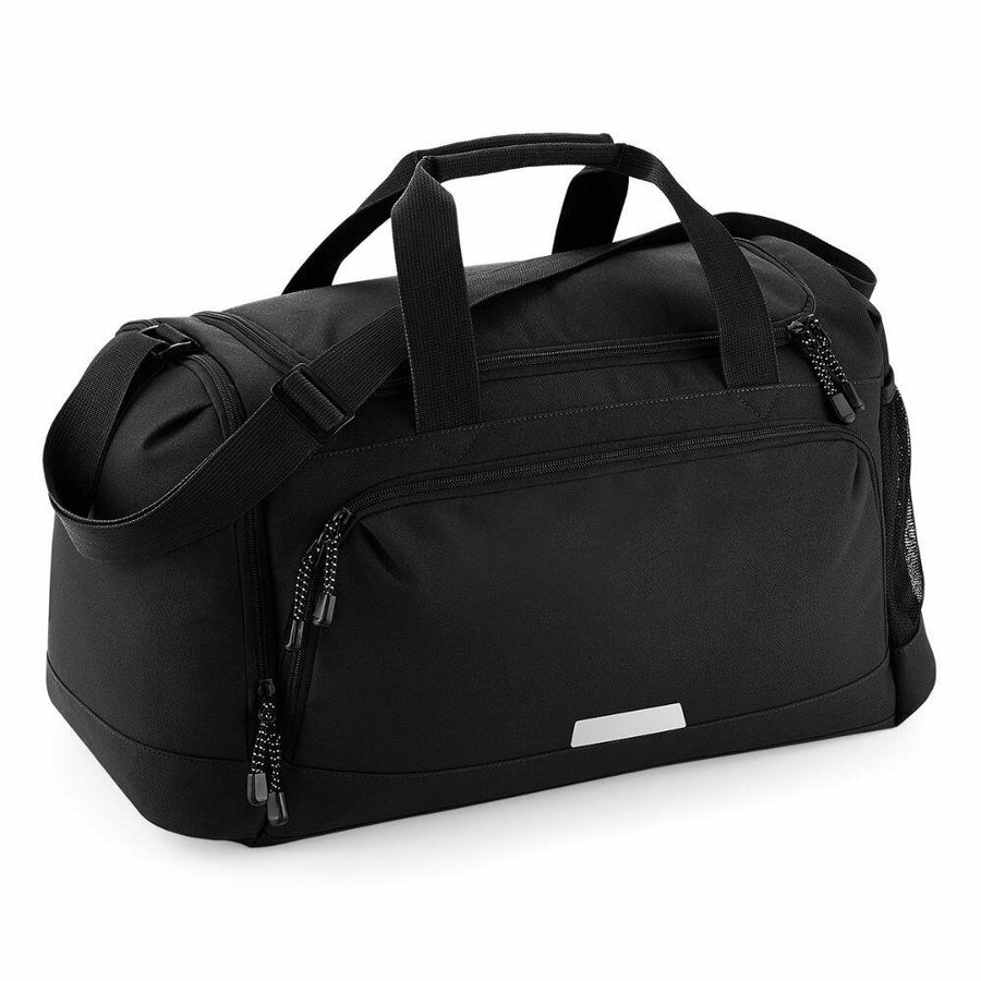 The Quadra QD449 is a black gym bag featuring multiple zippered compartments, two handles, and a shoulder strap.
