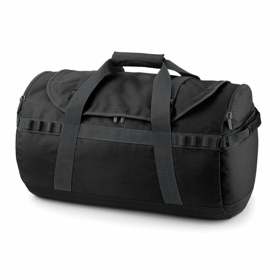 The Quadra QD525, a black duffel bag featuring two handles and a shoulder strap, is displayed on a white background.