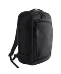 The Bags rucksack in black features a minimalist design with a top handle, side compression straps, and multiple zipped compartments, displayed on a plain white background.