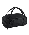 A sleek, minimalist black Bags duffel with two top handles, zippered compartments, and adjustable straps is displayed on a white background.