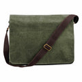 A Quadra QD610 canvas messenger bag in green with a brown adjustable strap.