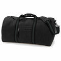 A Quadra QD613 black duffel bag featuring zippered pockets, sturdy handles, and a shoulder strap.