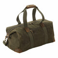 The Quadra QD650 is an olive green canvas duffel bag featuring brown leather accents and handles.