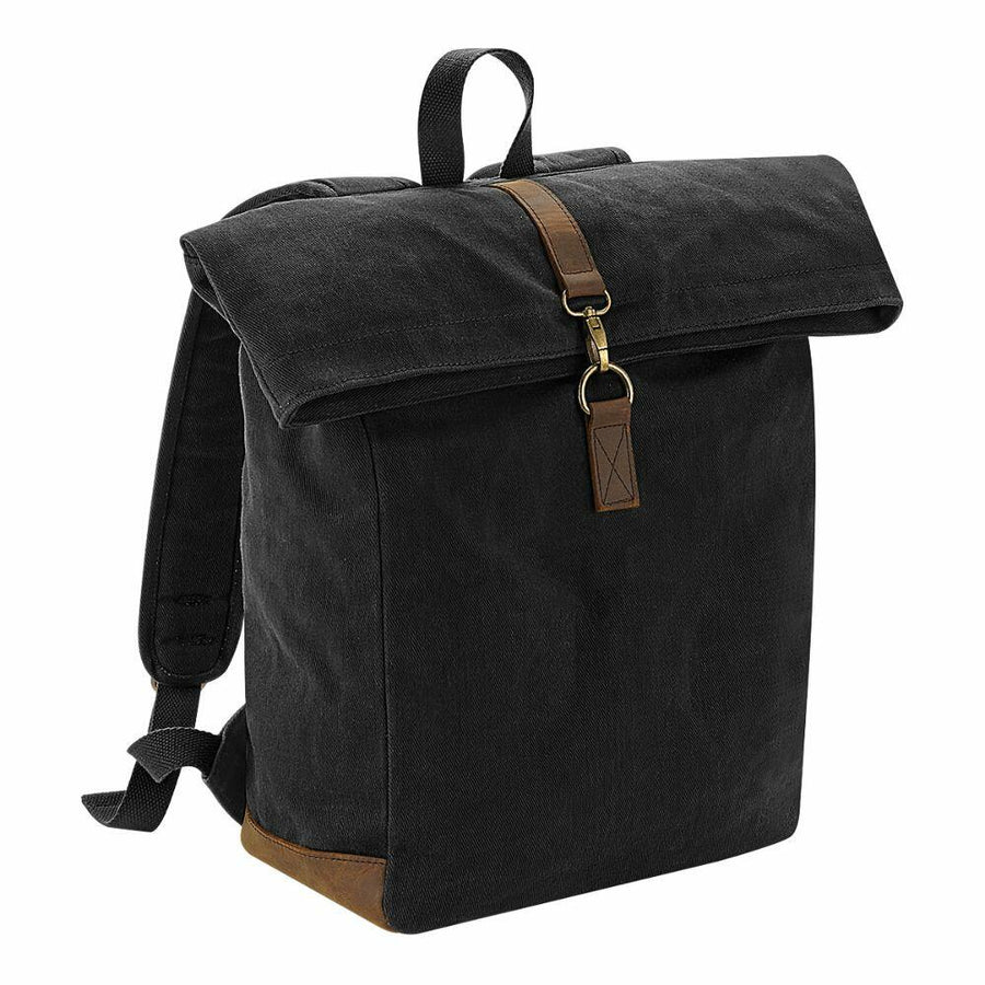 A black canvas backpack with brown leather accents, featuring a flap closure and adjustable shoulder straps, from the Quadra QD655 collection.