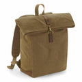 Introducing the Quadra QD655: a khaki canvas backpack featuring a roll-top design, complemented by brown leather accents and adjustable shoulder straps.