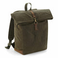 The QD655 by Quadra is a green canvas backpack featuring a roll-top design, leather strap closure, and adjustable shoulder straps.