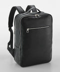 A Quadra QD774 black leather backpack with adjustable shoulder straps, a top handle, a front zippered pocket, and a main compartment with a zipper closure.