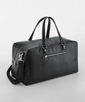 Quadra's QD778 black leather duffel bag with two top handles, a shoulder strap, and a front zip pocket on a light gray background.