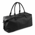 A Quadra QD878 black leather duffel bag featuring two handles and a side zipper pocket.