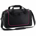 Quadra's QS077 black duffel bag is highlighted by pink piping and includes a zippered main compartment, side pockets, and an adjustable shoulder strap.