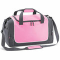 Introducing the QS077 by Quadra: a stylish pink and gray duffel bag featuring zippers and black handles. This sporty, rectangular design includes a convenient shoulder strap, a side mesh pocket, and a front zippered compartment.