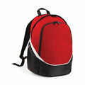 The QS255 backpack by Quadra features a red and black design with a front zip pocket and adjustable straps.