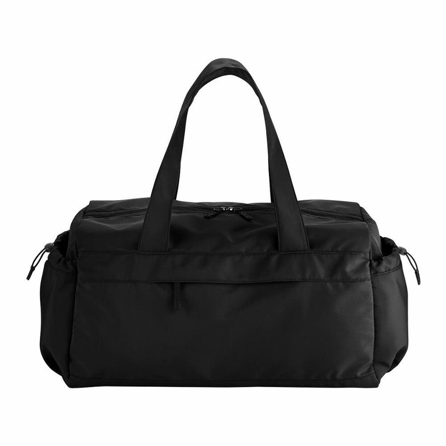A Quadra QS300 black duffel bag featuring two handles and multiple zippered compartments.