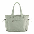 Introducing the Quadra QS303, a tote bag in light green featuring sturdy handles, a convenient front zipper pocket, and two side pockets with drawstrings.