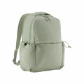 The QS306 by Quadra is a light green backpack featuring padded straps, two front pockets, and a zippered main compartment.