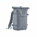The QS575 by Quadra is a gray waterproof roll-top backpack featuring multiple straps and a front zipper pocket.