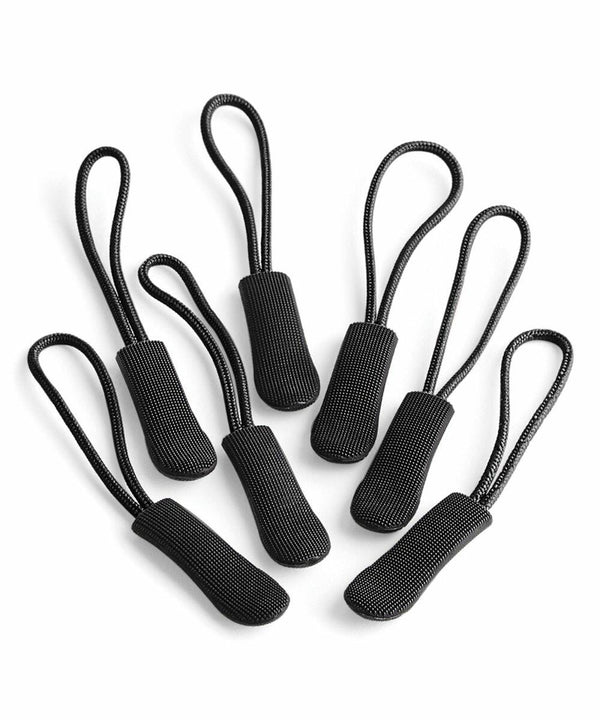 Seven Quadra QX505 black zipper pull replacements with looped cord handles are arranged against a white background.