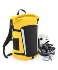 A Quadra SLX 25 litre waterproof rucksack in yellow and black is placed beside a white helmet, black gloves, a climbing harness, and a folded map on a white background.