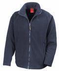 The Result R115A fleece jacket in navy blue is displayed, featuring a front zipper, high collar, and two side pockets. The inside is lined with black fabric, and a red label is visible inside the collar.