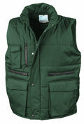 The R127A padded vest from Result Workguard features a high collar, multiple front pockets, and both zipper and snap-button closures in a green color.