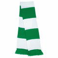 The R146X from Result Winter Essentials is a scarf designed with green and white horizontal stripes, featuring striking color contrasts and tassels at the ends.