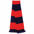 The Result Winter Essentials R146X scarf features alternating thick horizontal stripes in red and dark blue, with fringe detailing on both ends.