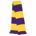 The Result Winter Essentials R146X is a scarf showcasing alternating horizontal stripes in purple and yellow, complemented by fringed ends.