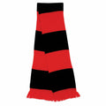 A Result Winter Essentials R146X scarf with red and black stripes and fringed ends laid flat.