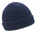 A knitted beanie in blue, featuring a ribbed texture and folded cuff from Result Winter Essentials, product R159X.