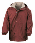 A Result R160A maroon hooded rain jacket, featuring a beige lining and displayed against a plain white background. This jacket includes front pockets, a zip closure with buttons, and elastic cuffs.