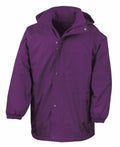 The Result R160A is a purple hooded rain jacket featuring a front zipper concealed by a buttoned flap, elastic cuffs, and zipped side pockets. It is showcased against a plain white background.