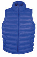 The Result Urban Outdoor R193M is a striking bright blue puffer vest featuring a high collar and a front zipper. Its quilted design, with horizontal stitching, provides a padded and insulated look while maintaining a minimalist style devoid of visible logos or designs.