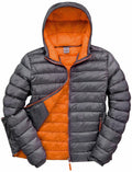 The Result Urban Outdoor R194M is a gray puffer jacket with orange accents, featuring a hood and highlighted by its orange lining when unzipped. It includes elastic cuffs and two zippered pockets for added functionality.
