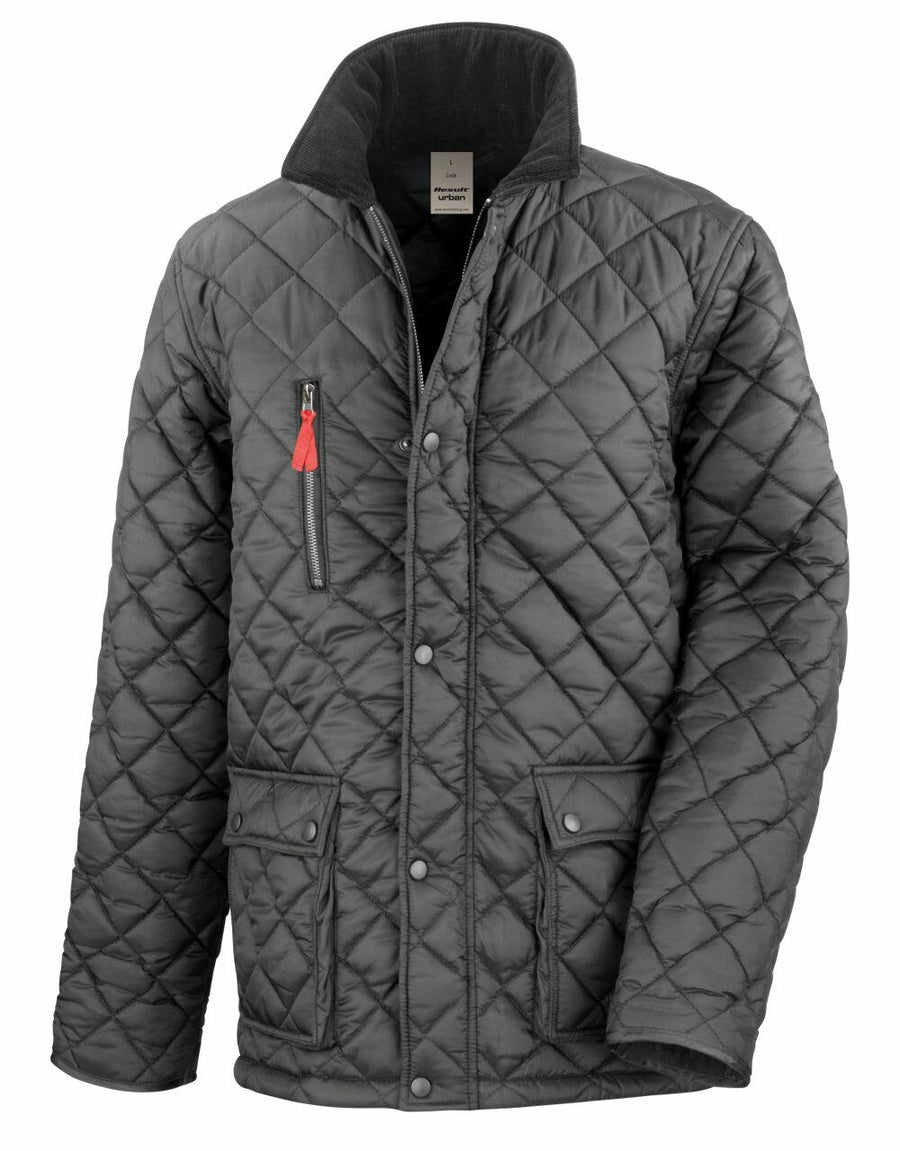 The R196X by Result Urban Outdoor is a gray quilted jacket featuring a high collar, a zippered chest pocket, and two buttoned front pockets.