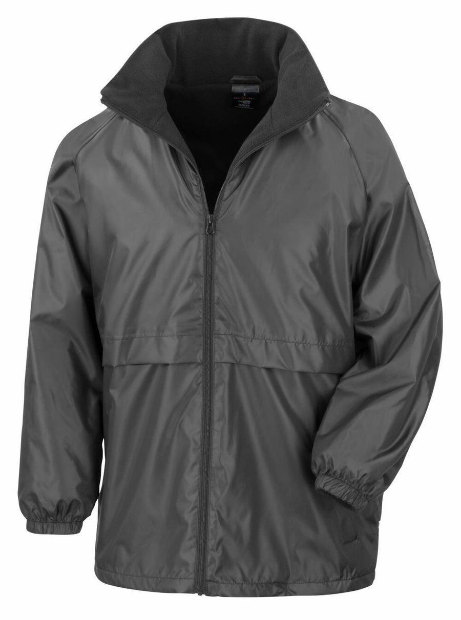 The R203X by Result Core is a lightweight, gray zip-up jacket featuring long sleeves and a high collar.