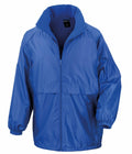 The Result Core R203X is showcased as a royal blue windbreaker featuring a zipper front, elastic cuffs, and a high collar. This jacket is designed with a relaxed fit to accommodate various weather conditions.