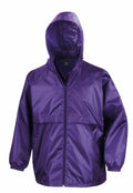 The Result Core R204X is a purple rain jacket featuring long sleeves, a hood, and a front zipper. It has a lightweight design and is waterproof, making it ideal for protection against wet weather conditions.
